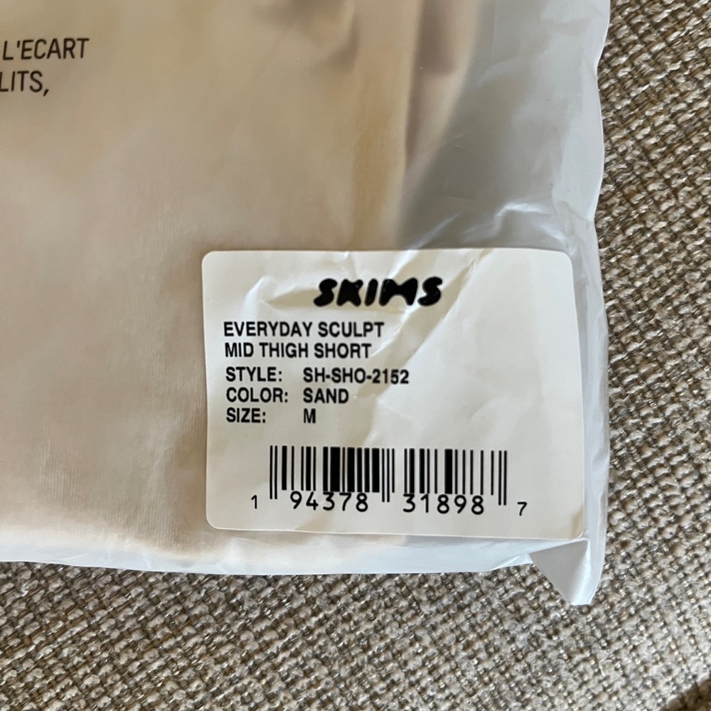 Skims Sand Mid Thigh Shorts